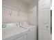A laundry room with a washer and dryer at 912 S Yampa St # 203, Aurora, CO 80017
