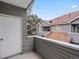 A patio featuring wood paneling and an exterior view at 912 S Yampa St # 203, Aurora, CO 80017