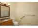 Bathroom with granite countertop vanity and updated accessibility features at 2896 W Riverwalk Cir # 204, Littleton, CO 80123