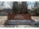 Welcoming brick sign for the Riverwalk Clubhouse, inviting residents to the community amenities at 2896 W Riverwalk Cir # 204, Littleton, CO 80123