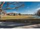 Landscaped community green space and homes at 2896 W Riverwalk Cir # 204, Littleton, CO 80123