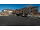 Exterior view of building and parking lot at 2896 W Riverwalk Cir # 204, Littleton, CO 80123