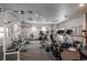 Well-equipped fitness center with treadmills, rowing machines, and weightlifting equipment at 2896 W Riverwalk Cir # 204, Littleton, CO 80123