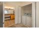 Laundry room featuring a washer and dryer with views into the bathroom at 2896 W Riverwalk Cir # 204, Littleton, CO 80123