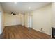 Living room with hardwood floors and access to other rooms at 2896 W Riverwalk Cir # 204, Littleton, CO 80123