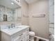 Clean bathroom with updated vanity and marble shower at 2368 W 119Th Ave, Denver, CO 80234