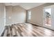 Well-lit bedroom with private deck access and neutral decor at 2368 W 119Th Ave, Denver, CO 80234