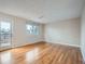 Hardwood floor Gathering room with sliding glass door to deck at 2368 W 119Th Ave, Denver, CO 80234