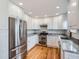 Modern kitchen with stainless steel appliances and granite countertops at 2368 W 119Th Ave, Denver, CO 80234