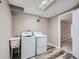 Basement laundry room with washer, dryer, and utility sink at 2368 W 119Th Ave, Denver, CO 80234