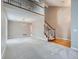 Spacious living room with high ceilings, hardwood floors, and a staircase at 2368 W 119Th Ave, Denver, CO 80234