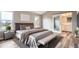 Spacious main bedroom with plush carpet and en-suite bathroom at 2368 W 119Th Ave, Denver, CO 80234