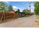 View of the two car garage behind the property from the back alley at 1215 Jackson St, Denver, CO 80206