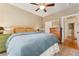 Bedroom featuring a bed with ceiling fan and dresser, providing a relaxing space at 1215 Jackson St, Denver, CO 80206
