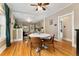 Elegant dining room with hardwood floors and views into the living room at 1215 Jackson St, Denver, CO 80206
