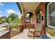 Inviting front porch with a rocking chair perfect for enjoying quiet moments outside at 1215 Jackson St, Denver, CO 80206