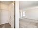 Bright bedroom with large closet, neutral carpet, and natural light at 1889 Water Birch Way, Castle Rock, CO 80108