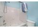 Clean bathroom with a soaking tub and shower combination, complemented by a toilet at 4451 S Ammons St # 4-108, Littleton, CO 80123