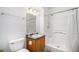 Clean bathroom with a walk-in shower, vanity, and modern fixtures offers a convenient and comfortable space for grooming at 4451 S Ammons St # 4-108, Littleton, CO 80123