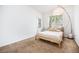 Serene bedroom with neutral tones and natural light creates a calming retreat for rest and relaxation at 4451 S Ammons St # 4-108, Littleton, CO 80123