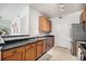 Functional kitchen features ample counter space, efficient appliances, and a convenient layout for easy meal preparation at 4451 S Ammons St # 4-108, Littleton, CO 80123