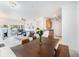 Bright, open-concept living space features a fireplace and access to a balcony, seamlessly connecting indoor and outdoor living at 4451 S Ammons St # 4-108, Littleton, CO 80123