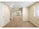 Spacious basement with stairs and window offers versatile potential for various uses at 4860 W 125Th Ave, Broomfield, CO 80020