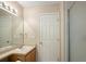 Well-lit bathroom features a shower and a vanity with ample counter space at 4860 W 125Th Ave, Broomfield, CO 80020