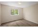 Bedroom with neutral walls, carpeting, white trim and one window at 4860 W 125Th Ave, Broomfield, CO 80020