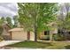Charming two-story home with a well-manicured lawn, brick accents, and an attached two-car garage at 4860 W 125Th Ave, Broomfield, CO 80020