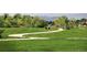 Scenic view of a park with mature trees, walking paths, and a soccer field against a mountain backdrop at 4860 W 125Th Ave, Broomfield, CO 80020