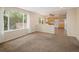 Sunlit living room features an open layout and backyard views for a relaxing atmosphere at 4860 W 125Th Ave, Broomfield, CO 80020