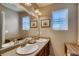 Double vanity bathroom with shower and plenty of storage at 1567 S Dallas Cir, Denver, CO 80247