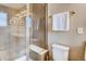 Bathroom with shower, toilet and linen storage at 1567 S Dallas Cir, Denver, CO 80247