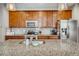 Kitchen with stainless steel appliances and island at 1567 S Dallas Cir, Denver, CO 80247