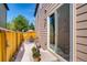 Private patio with seating area and planters at 1567 S Dallas Cir, Denver, CO 80247