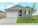 Charming single-Gathering home featuring a two-car garage and a well-manicured front lawn at 2151 Christina St, Fort Lupton, CO 80621