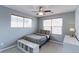 Cozy bedroom featuring a ceiling fan and built-in shelving at 14214 Lakeview Ln, Broomfield, CO 80023