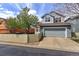 Attached two-car garage and fenced yard offer convenience and privacy at 14214 Lakeview Ln, Broomfield, CO 80023
