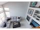Spacious living room with high ceilings, large sectional, and fireplace at 14214 Lakeview Ln, Broomfield, CO 80023