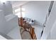 Open stairway leading to a cozy sitting area and offering abundant natural light from large windows at 14214 Lakeview Ln, Broomfield, CO 80023