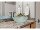 Bathroom close up of modern vessel sink on granite countertop at 18601 E Water Dr # A, Aurora, CO 80013