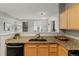 This kitchen offers granite countertops with stainless-steel appliances at 18601 E Water Dr # A, Aurora, CO 80013