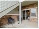 Outdoor patio with brick accents and seating at 18601 E Water Dr # A, Aurora, CO 80013