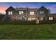 Townhouse backyard with green grass and wooden fence at 9636 W Chatfield Ave # C, Littleton, CO 80128