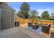 Outdoor patio with stylish furniture and wood fence at 9636 W Chatfield Ave # C, Littleton, CO 80128