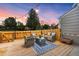 Outdoor patio with stylish furniture and string lights at 9636 W Chatfield Ave # C, Littleton, CO 80128