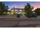 Exterior view of townhomes with parking at 9636 W Chatfield Ave # C, Littleton, CO 80128