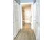 Bathroom featuring white tiled shower/tub and closet space at 444 17Th St # 701, Denver, CO 80202