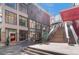 Modern building exterior with staircase and shops at 444 17Th St # 701, Denver, CO 80202
